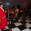 Fred the Town Crier puts Dave in the stocks
