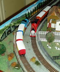 Thomas and the Trucks pass James, Annie and Clarabel