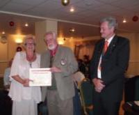 DG Ron with Lions Helen and Mike Spencer