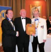 Weymouth and Portland President Trevor Stratton with Lion Norman Apps receiving an MJF from DG Ron